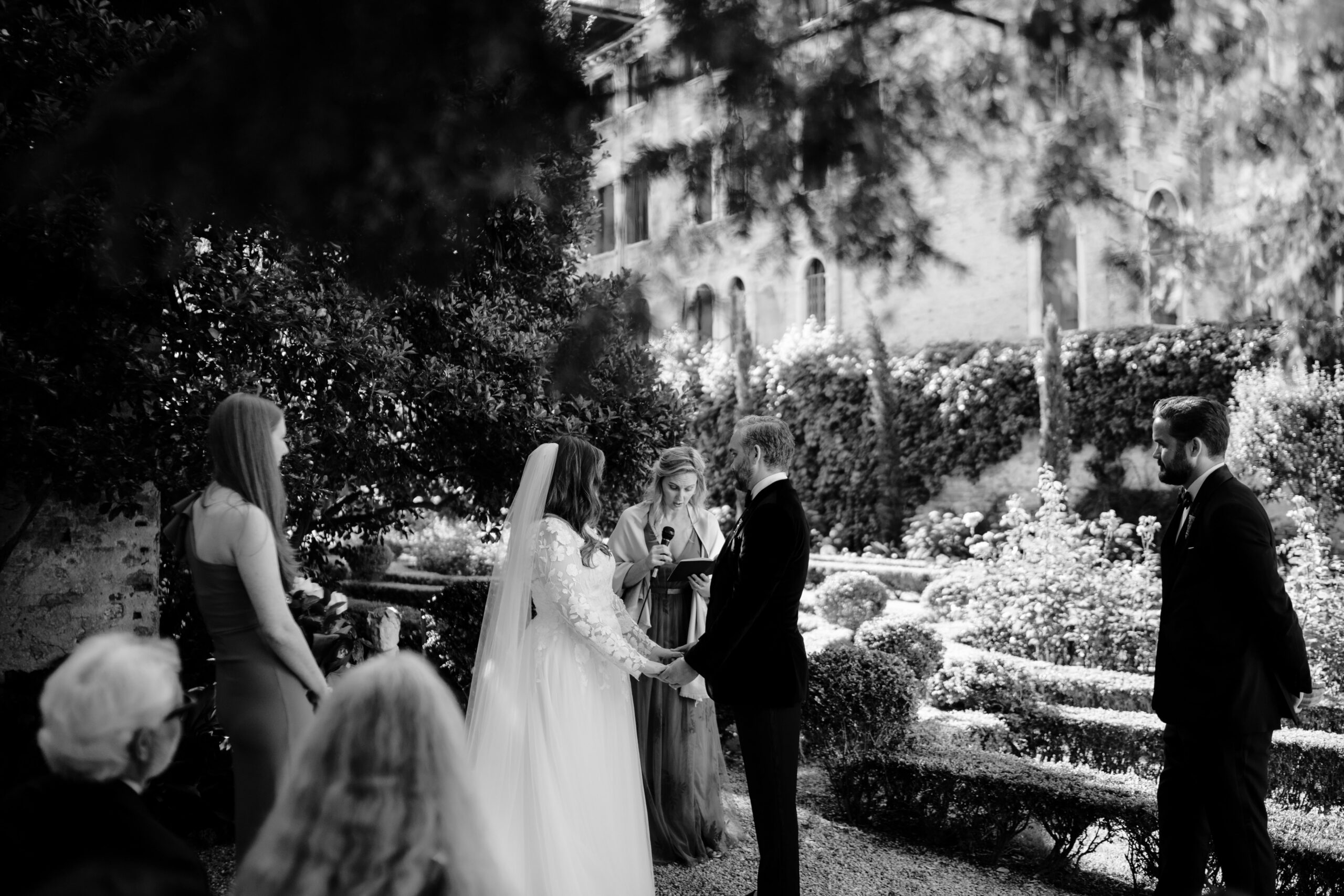 Symbolic wedding ceremony in the garden in Venice